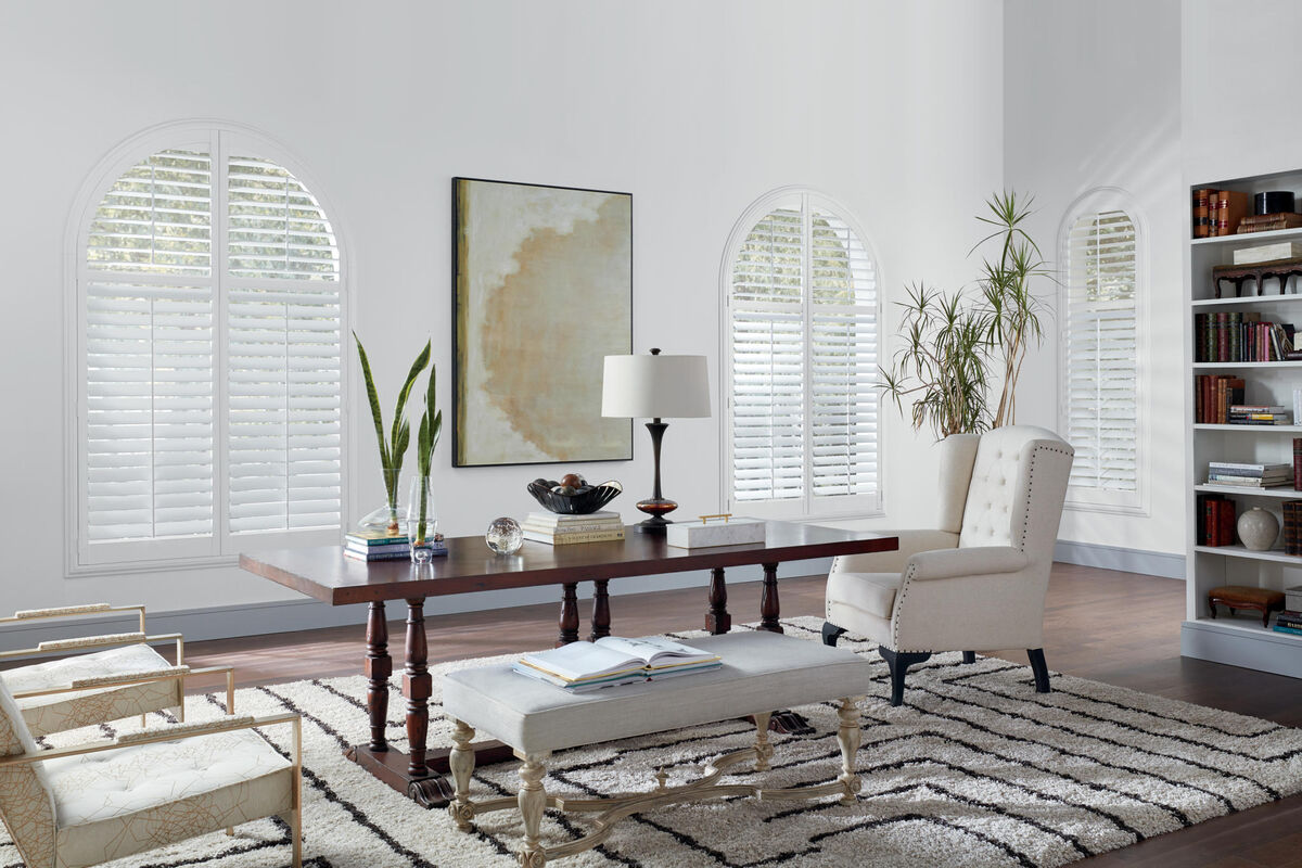 Hunter Douglas Newstyle® Hybrid Shutters on semi arched windows