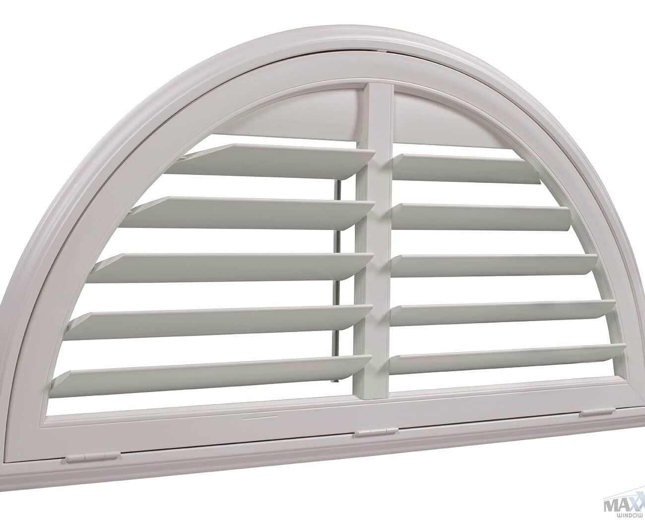 White arched window shutter with adjustable louvers, designed for decorative and functional window covering.